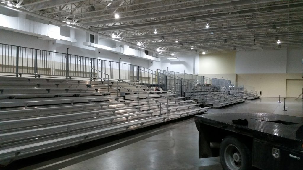 Three 45' towable stadium style bleachers seating for 819 people indoors
