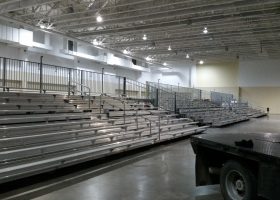 Three 45′ towable stadium style bleachers seating for 819 people indoors