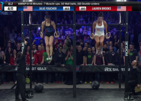 Female competitors doing muscle-ups