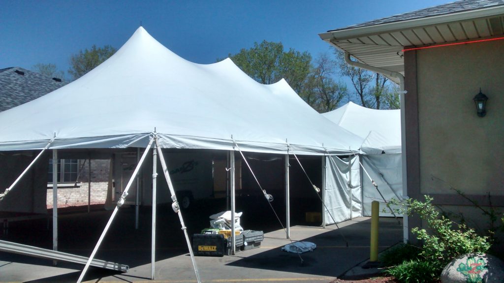 30' x 60' rope and pole tent ending in 40' x 140' tent at restaurant for Cinco de Mayo