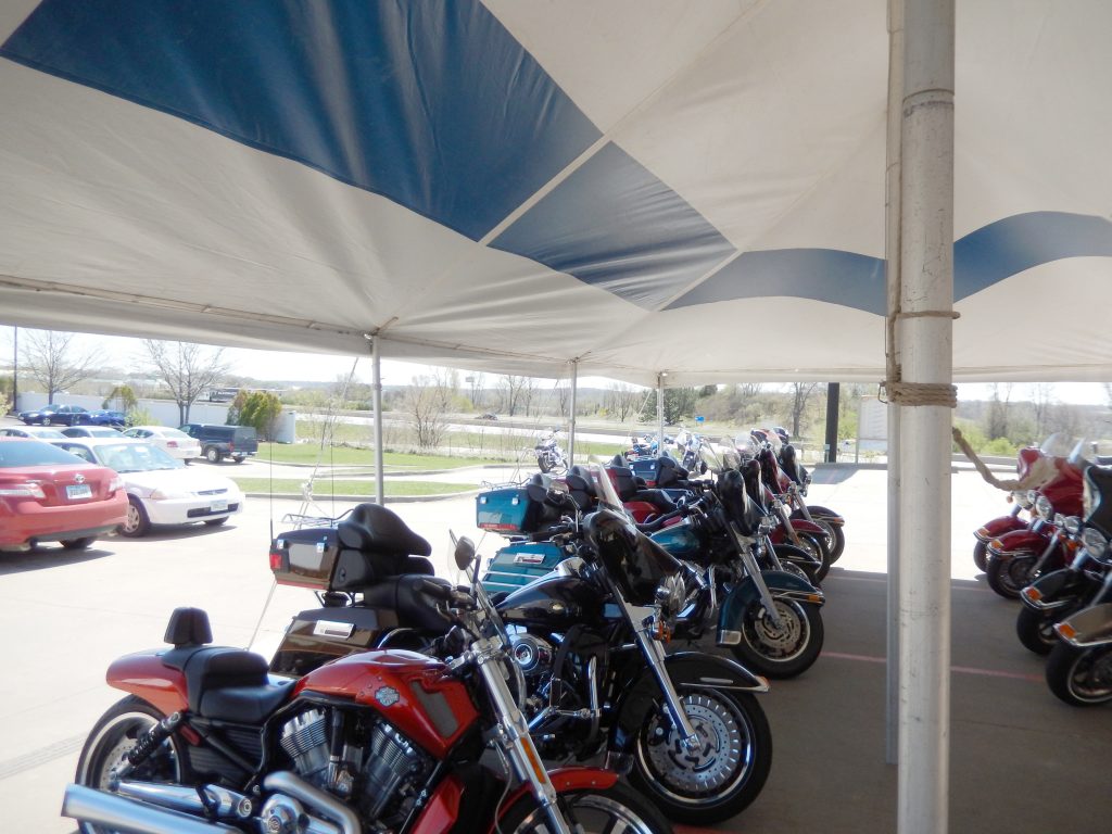 Bikes under tent at McGrath Hawkeye Harley-Davidson