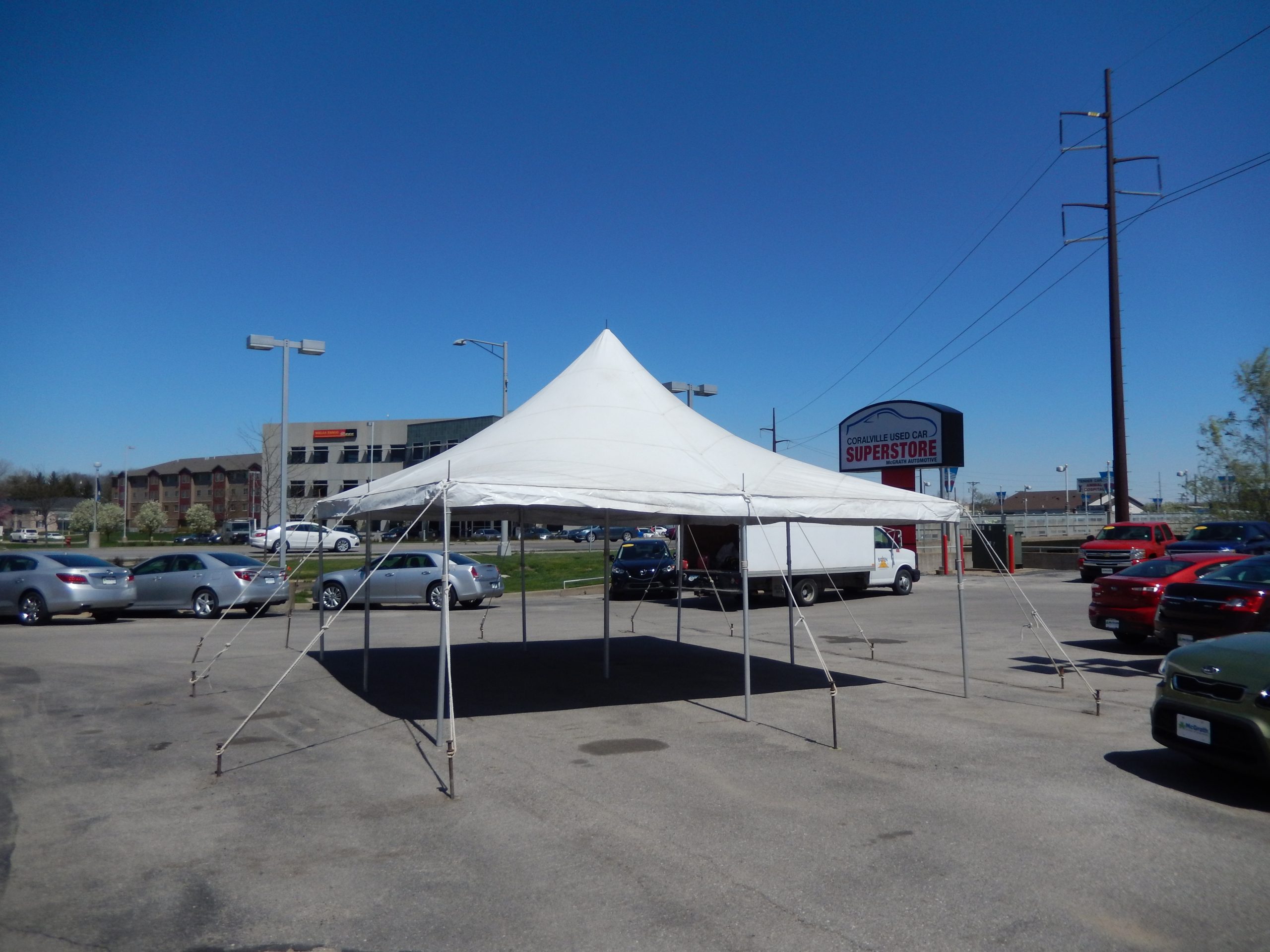 Event tent at Coralville Used Car Superstore