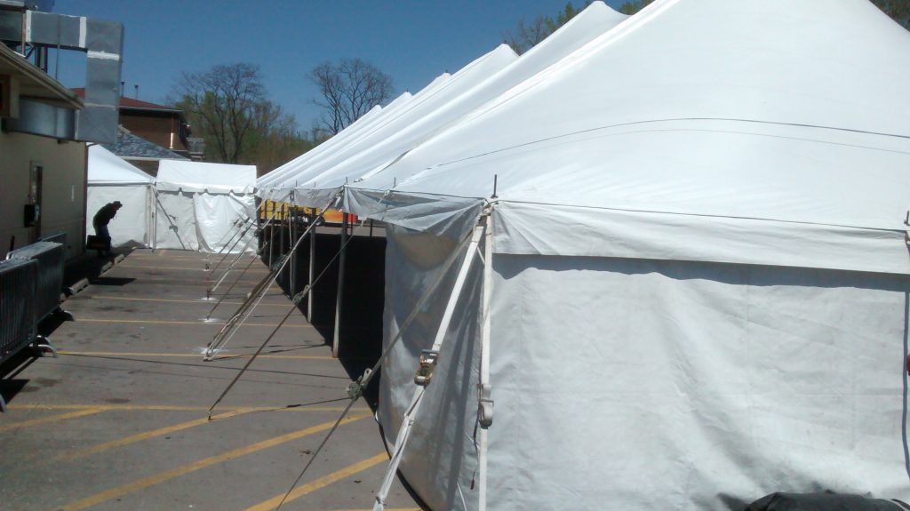 Outside of 40' x 140' rope and pole tent at restaurant for Cinco de Mayo