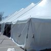 Outside of 40' x 140' rope and pole tent at restaurant for Cinco de Mayo with side walls