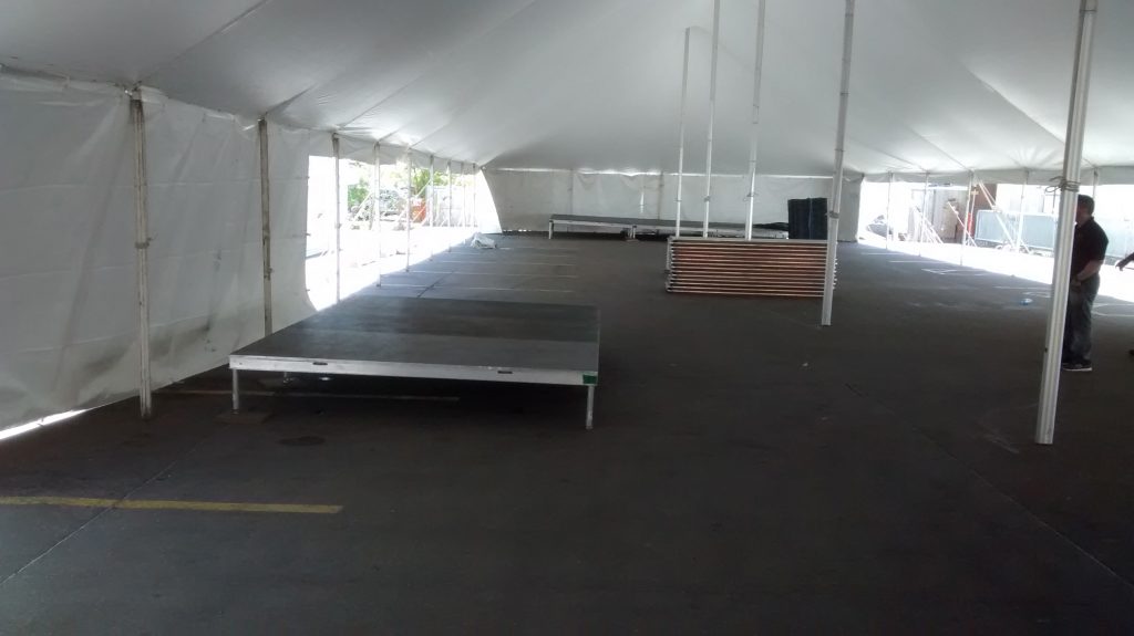 Stage under 40' x 140' rope and pole tent at restaurant for Cinco de Mayo