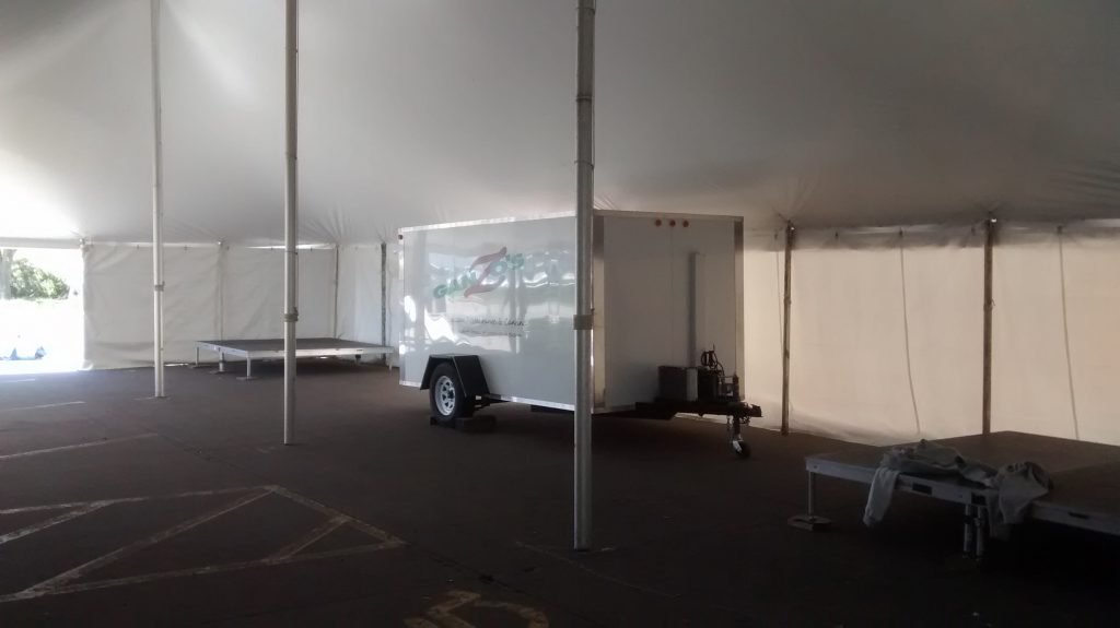 Trailer under event tent