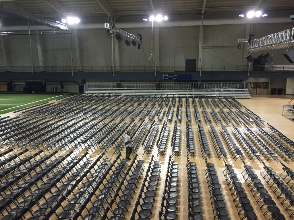 Chairs and bleachers setup for 2015 graduating class at William Penn University