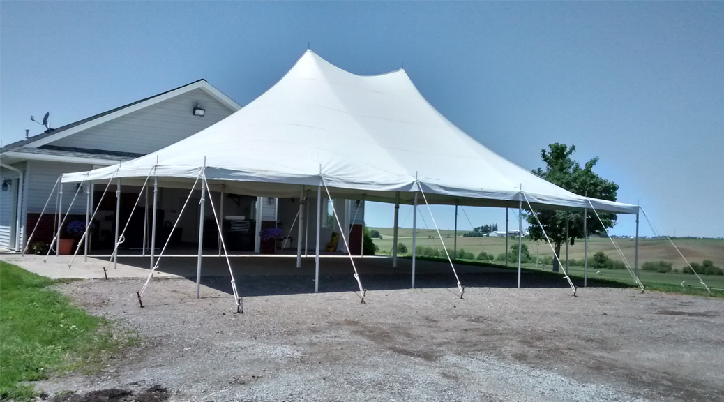 Family tent event 30' x 40' rope and pole tent in Williamsburg Iowa
