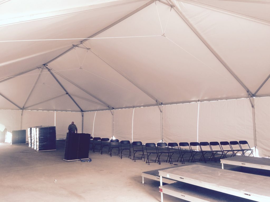 Chair set-up under temporary corporate event structure 40 x 80 Hybrid tent