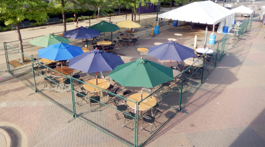 Entire Beverage garden or Beer garden with tent tables and fencing