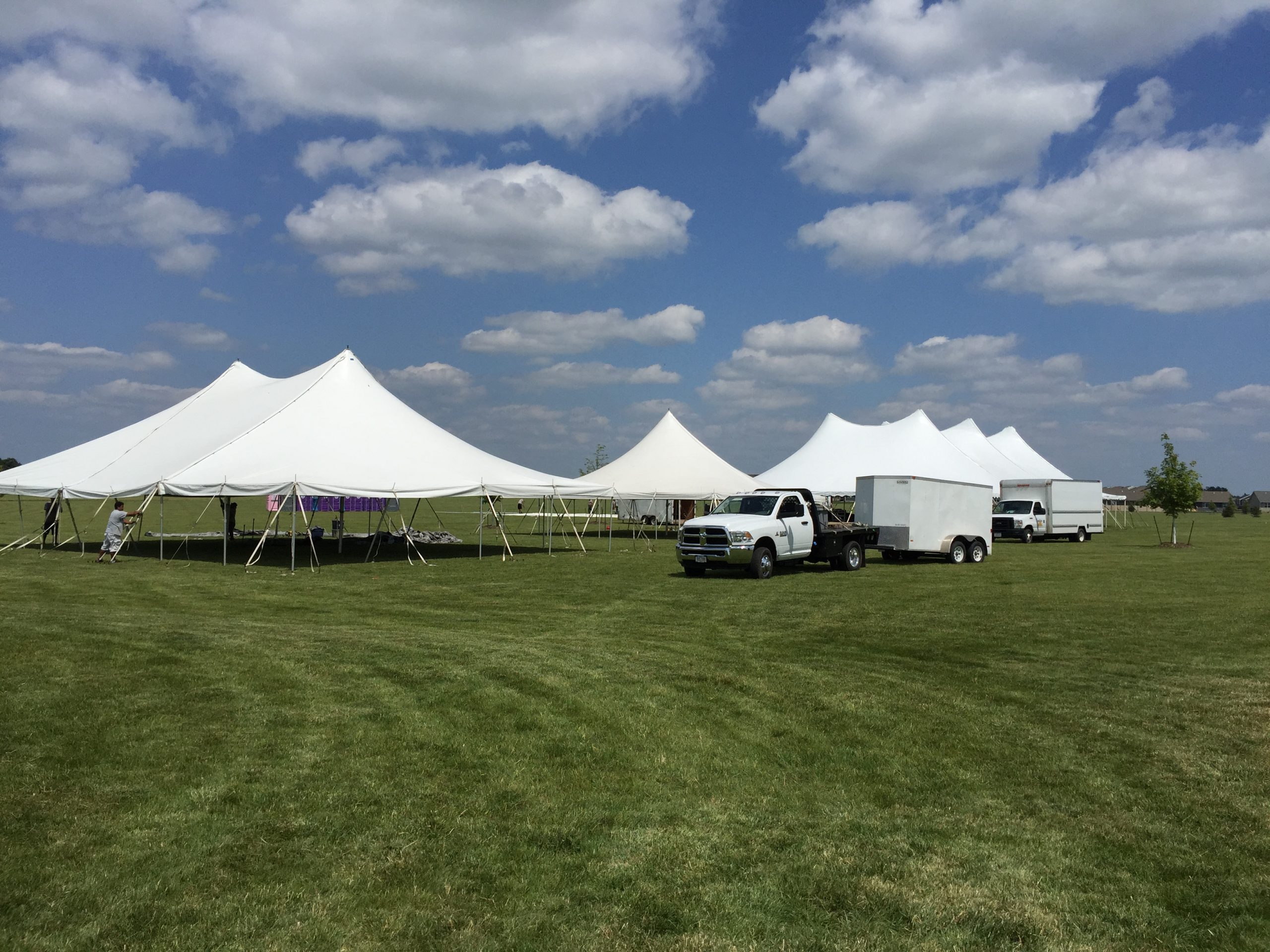 Outdoor festival tent set-up for Blues and BBQ by Big Ten Rentals