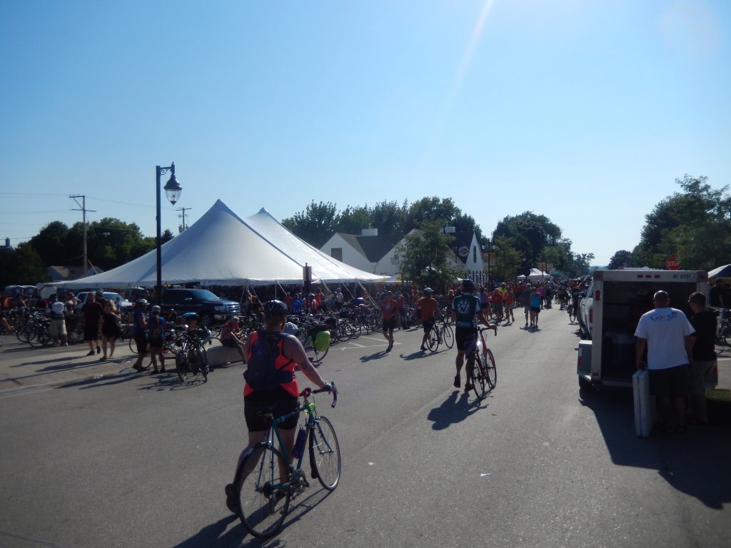 Riders by beer tent at RAGBRAI