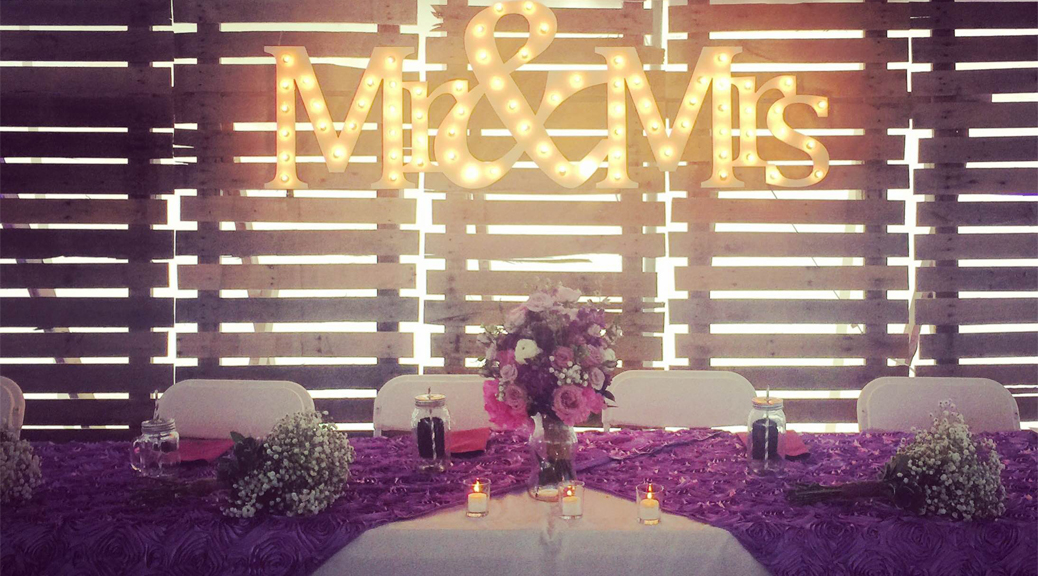 Stylish wedding head table linen and backdrop