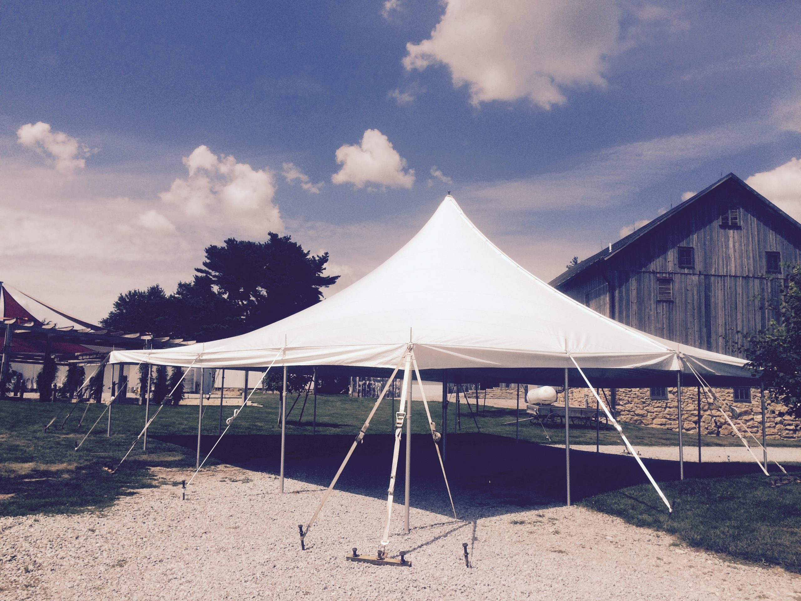 Tent at Sutliff Cider Company in front of the barn