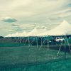 Twenty-two 20' x 30' rope and pole tents