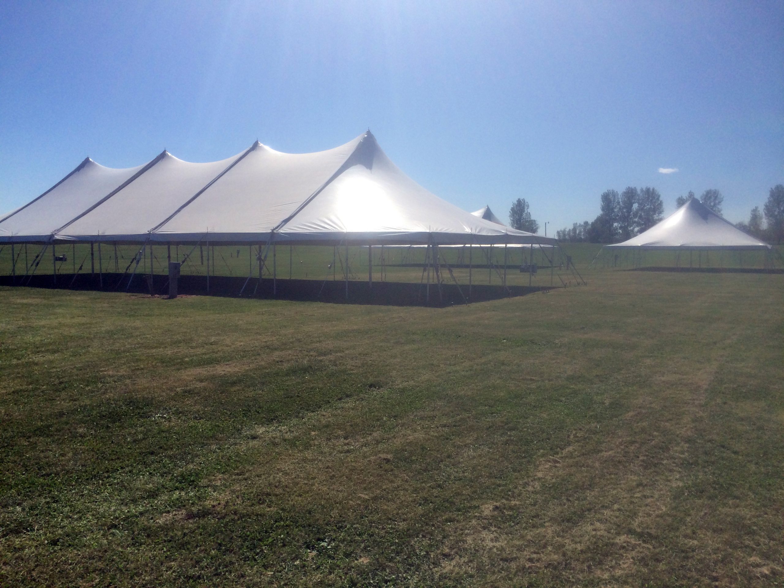 40′ x 100′, 20′ x 40′ and 40′ x 60′ rope and pole tents in Amana Colonies