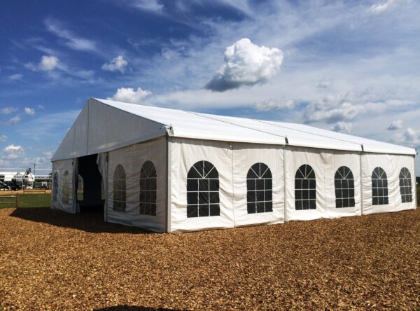 Outside view of 50' x 50' clear span tent with french window side wall