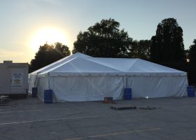 Refrigerated trailer, 20′ x 40′ frame tent and 40′ x 80′ hybrid tent at Terex corporate event in Waverly, Iowa