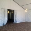 Under 30' x 50' clear span tent with interior gable wall