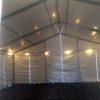 Under 30' x 50' clear span tent with perimeter lighting