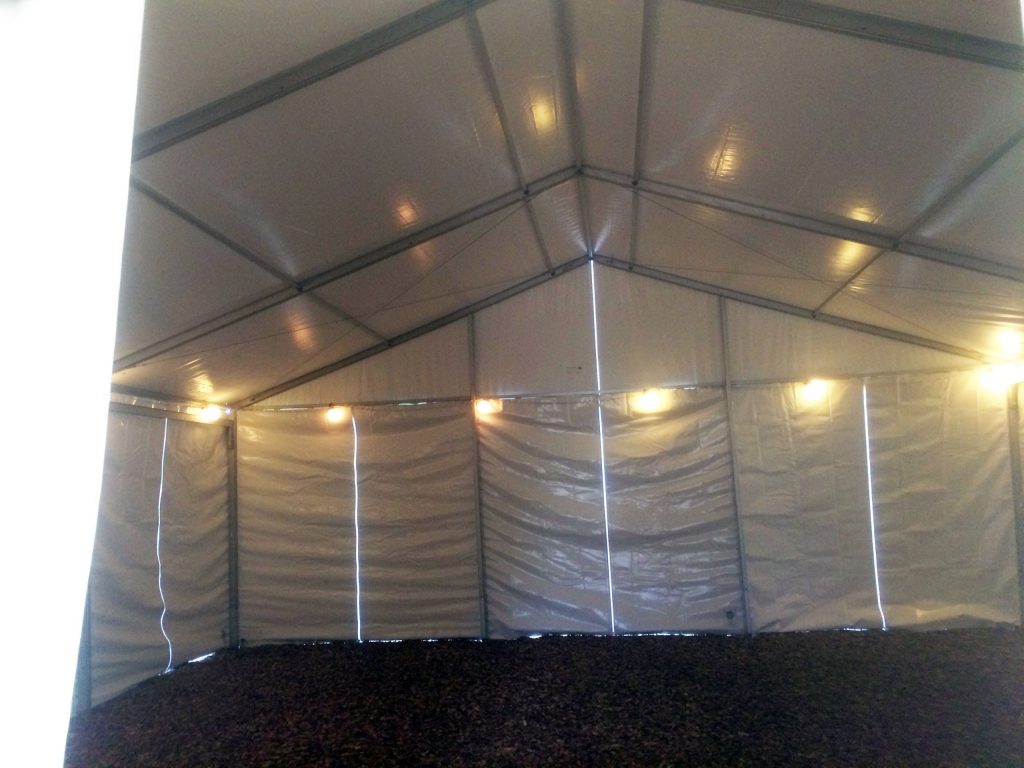 Under 30' x 50' clear span tent with perimeter lighting