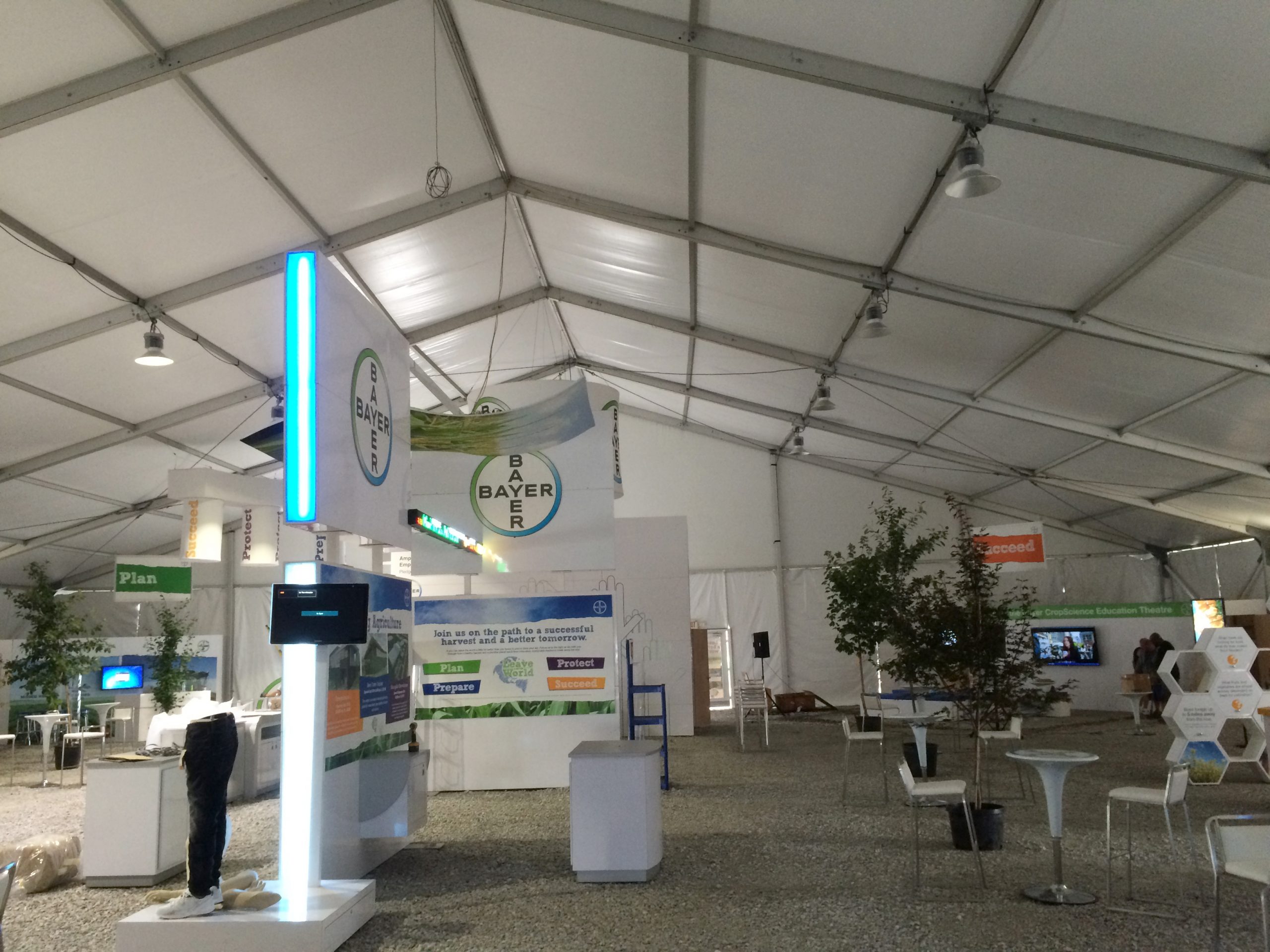 View of the inside the Bayer Pharmaceutics 100′ x 131′ clearspan tent at Farm Progress Show