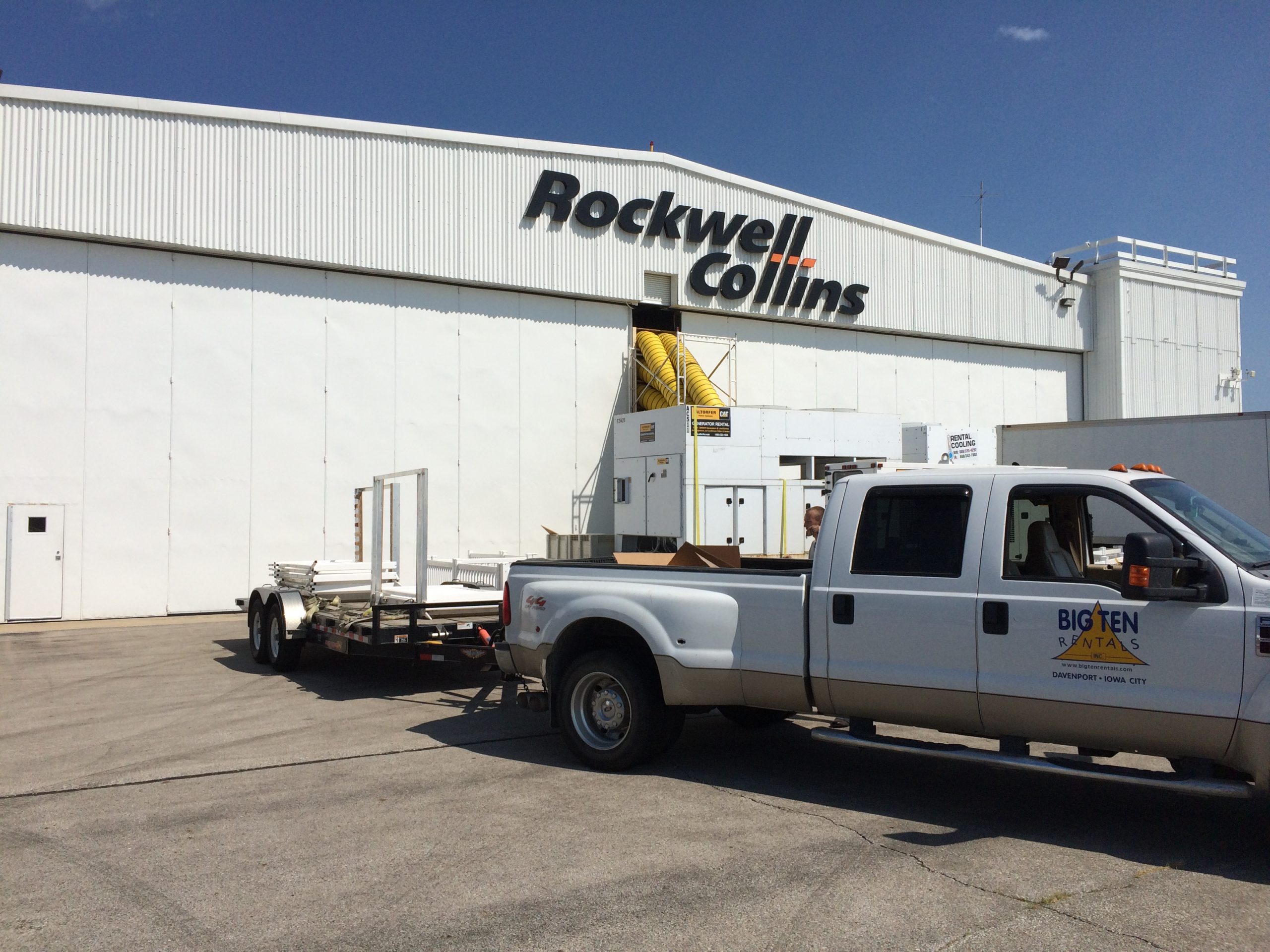 HVAC Air Conditioning of the Rockwell Collins airplane hangar at the Eastern Iowa Airport and Big Ten Rentals Truck
