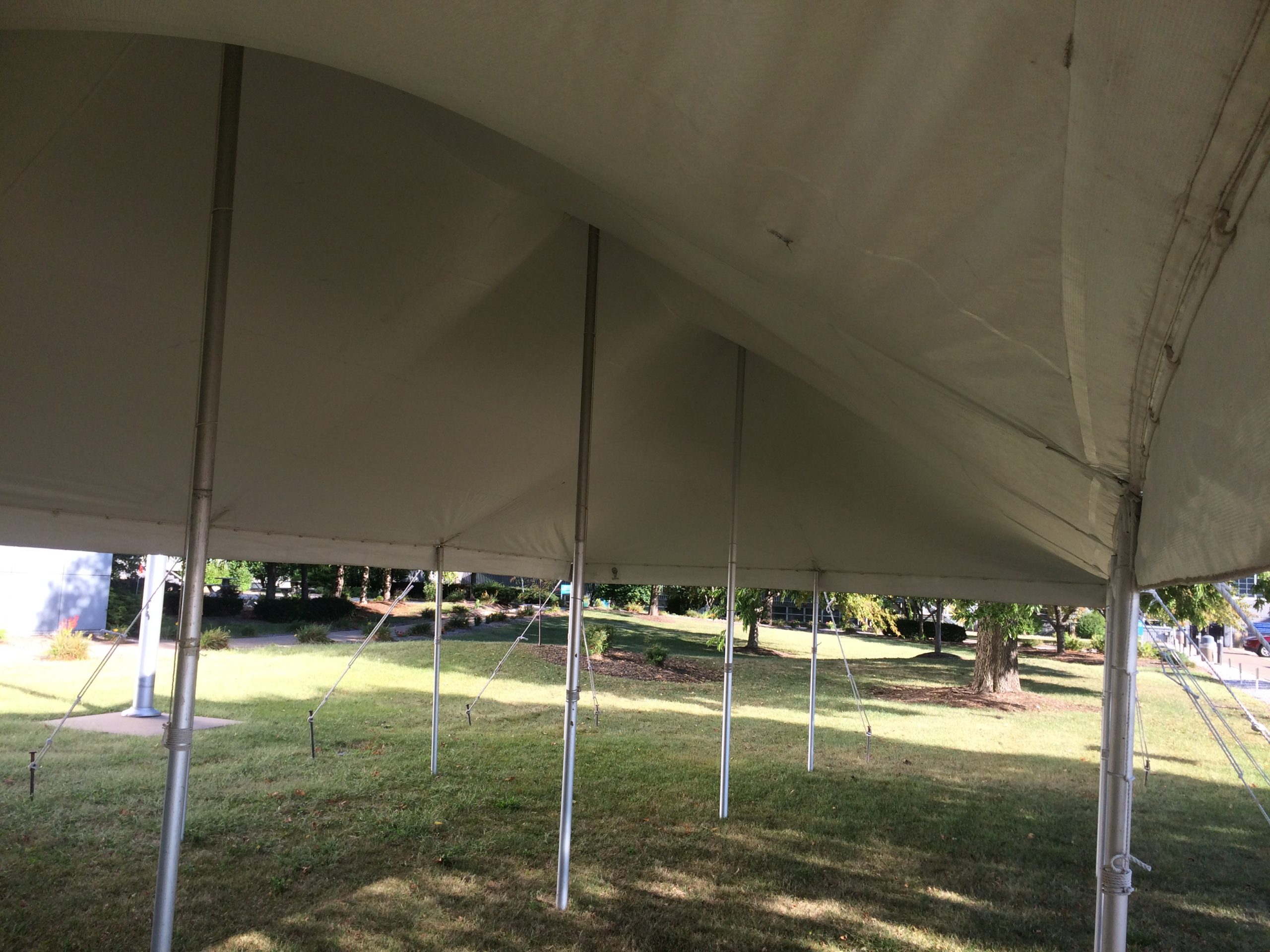 Under 20′ x 40′ rope an pole tent at Alcoa in Bettendorf, Iowa
