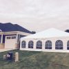 30' x 60' frame tent for wedding reception in Dubuque, Iowa next to a home