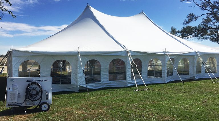 40′ x 60′ Rope & Pole Wedding tent in De Witt, Iowa with sidewalls, dance floor, Edison lighting and more!