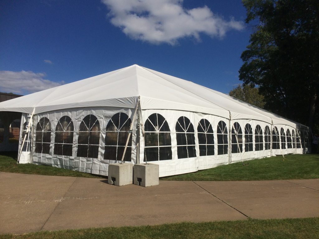 Corner of 40' x 80' wedding reception tent at Oakwood Country Club in Coal Valley Illinois with deadweight