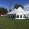 Outside of 40' x 60' rope and pole wedding tent with sidewall in De Witt, Iowa