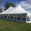 Side of 40' x 60' rope and pole wedding tent with sidewall in De Witt, Iowa