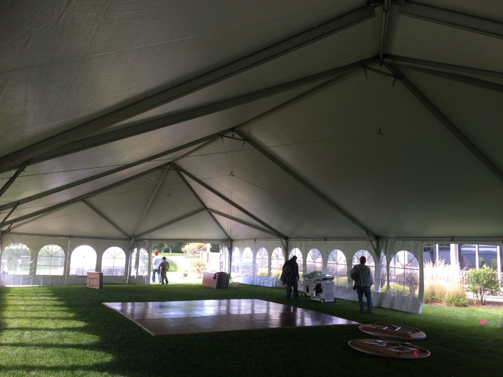 Under 40' x 80' wedding reception tent at Oakwood Country Club golf course in Coal Valley, IL