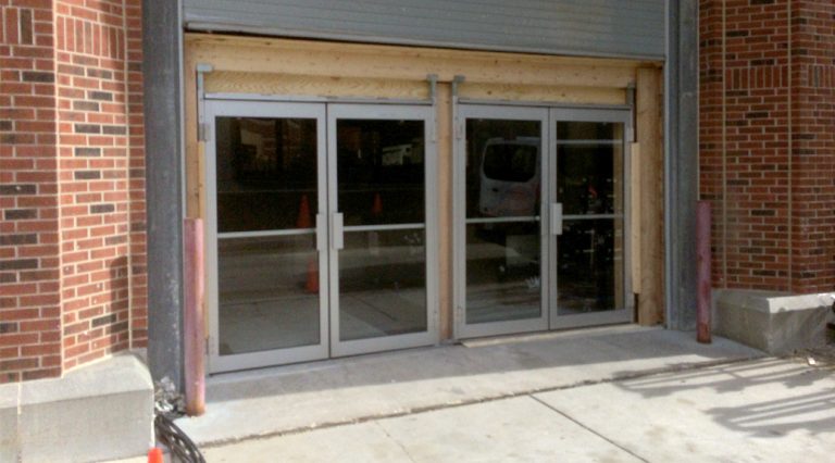 Increased event hall capacity by adding double glass door fire exits