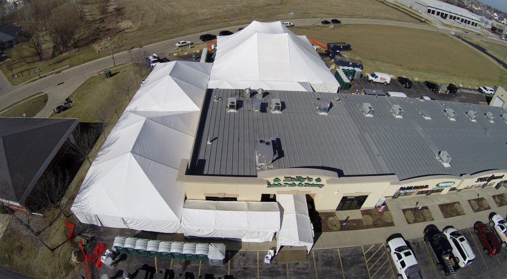 Aerial photography of tents at the front of Kelly's Irish Pub & Eatery in Davenport, IA