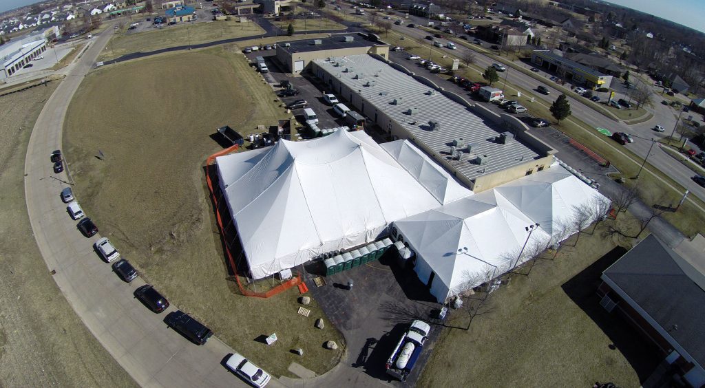 Aerial photography of tents at the side of Kelly's Irish Pub & Eatery in Davenport, IA