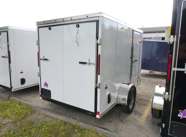 Back side of White 6'x10' enclosed cargo trailer Vin Number 2803