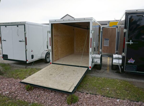 Door open on White 6'x10' enclosed cargo trailer Vin Number 2803