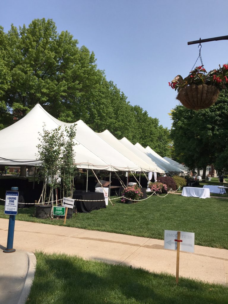 Ready for the event: Outside 40' x 140' Rope and Pole tent in Davenport, IA for a Wine Festival Wine Tasting event.