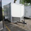 Right side of White 6'x10' enclosed cargo trailer Vin Number 2803