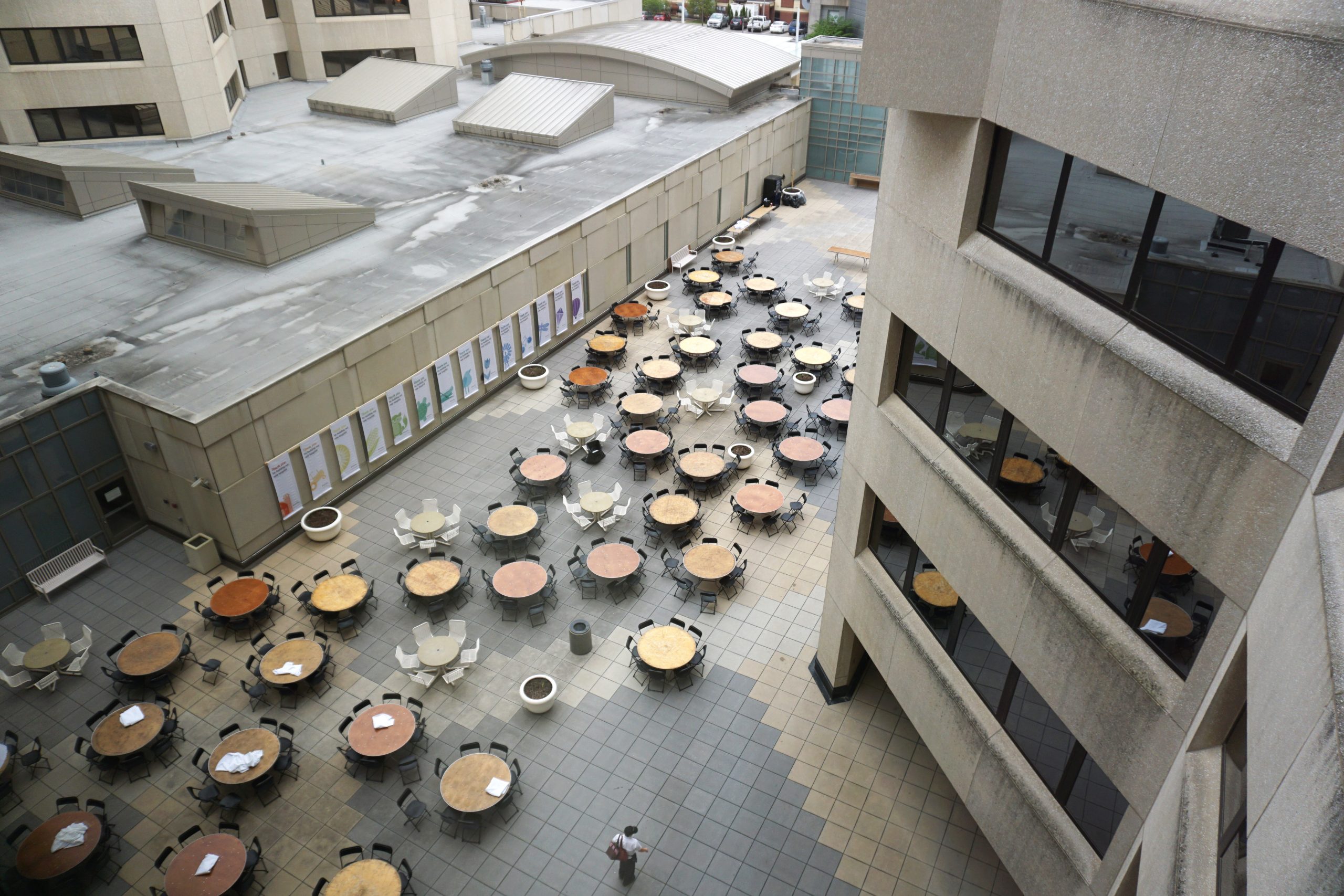 Aerial view of tables and chairs set up at University of Iowa Hospitals and Clinics courtyard