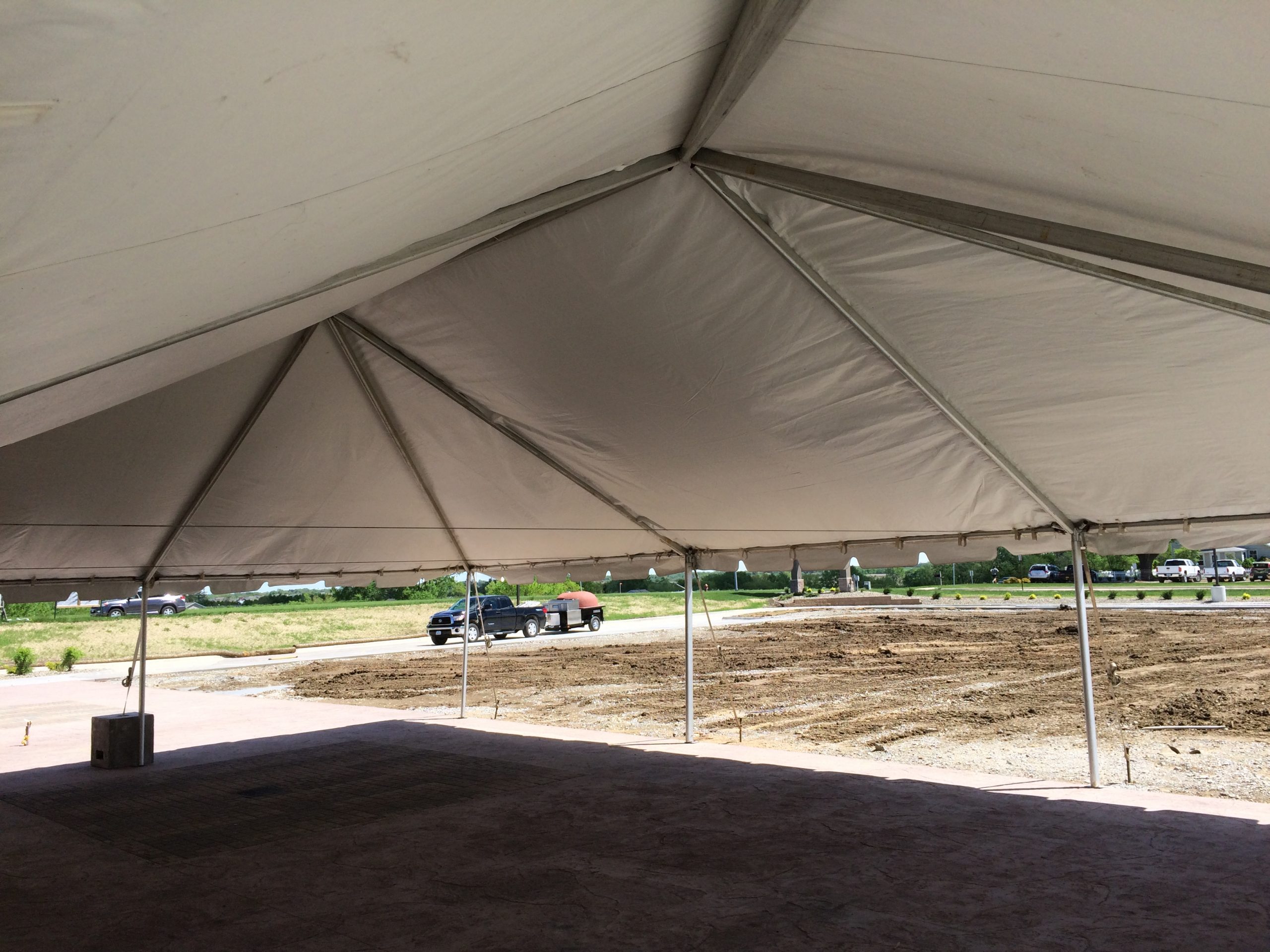 Under 30' x 45' Frame tent set up at Two Rivers Bank & Trust grand opening in Coralville, Iowa