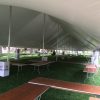 Under the 40' x 140' Rope and Pole tent in Davenport, IA, for a Wine Festival/Wine Tasting event.
