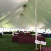 Under the 40' x 140' Rope and Pole tent in Davenport, IA for a Wine Festival Wine Tasting event.
