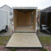 White 6'x10' enclosed cargo trailer Vin Number 2803 with back door open