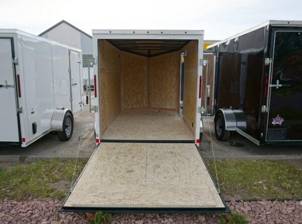 White 6'x10' enclosed cargo trailer Vin Number 2803 with back door open