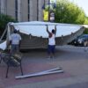 20' x 20' frame tent being assembled at the 2016 Iowa Arts Fest setup