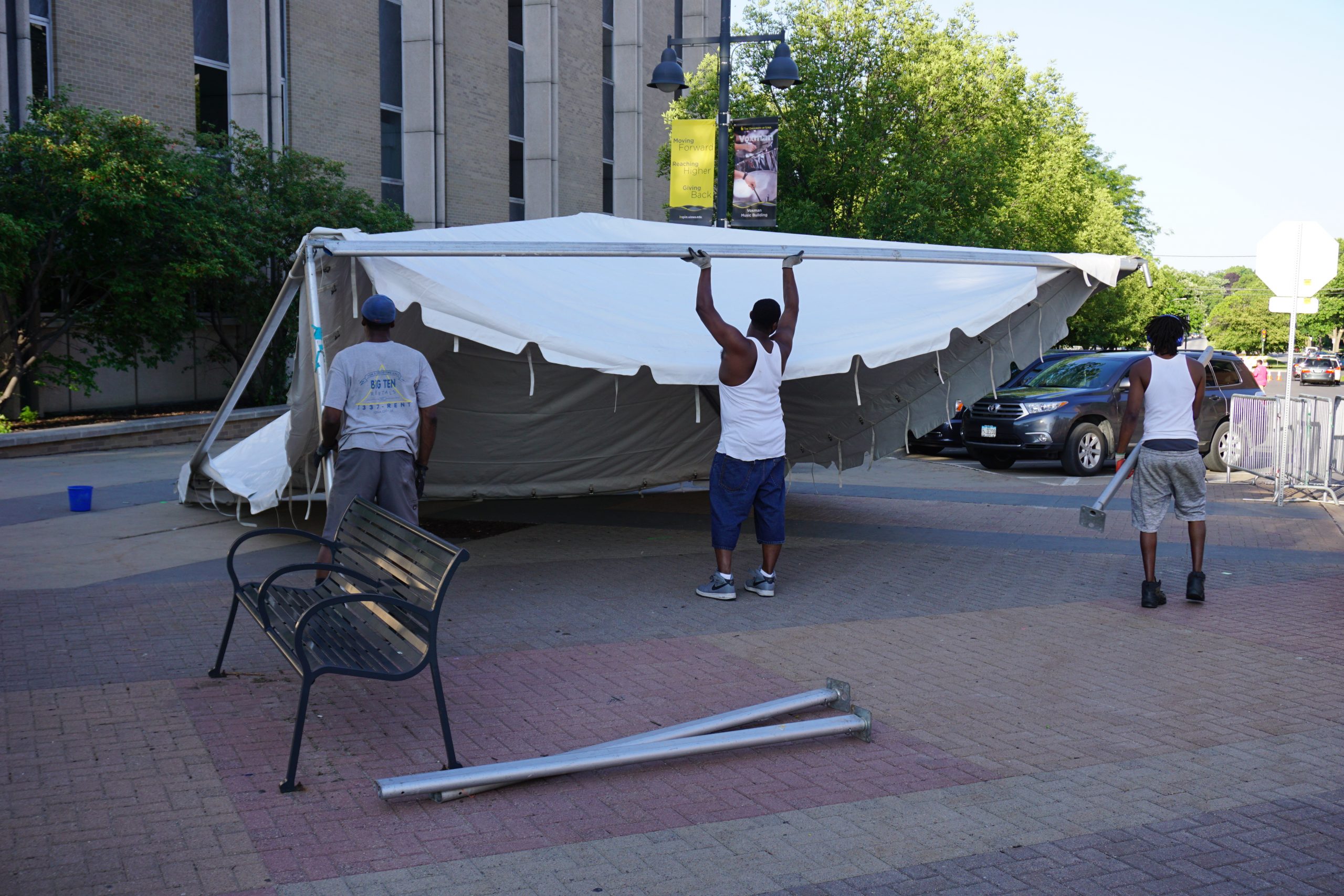 20' x 20' frame tent being assembled at the 2016 Iowa Arts Fest setup