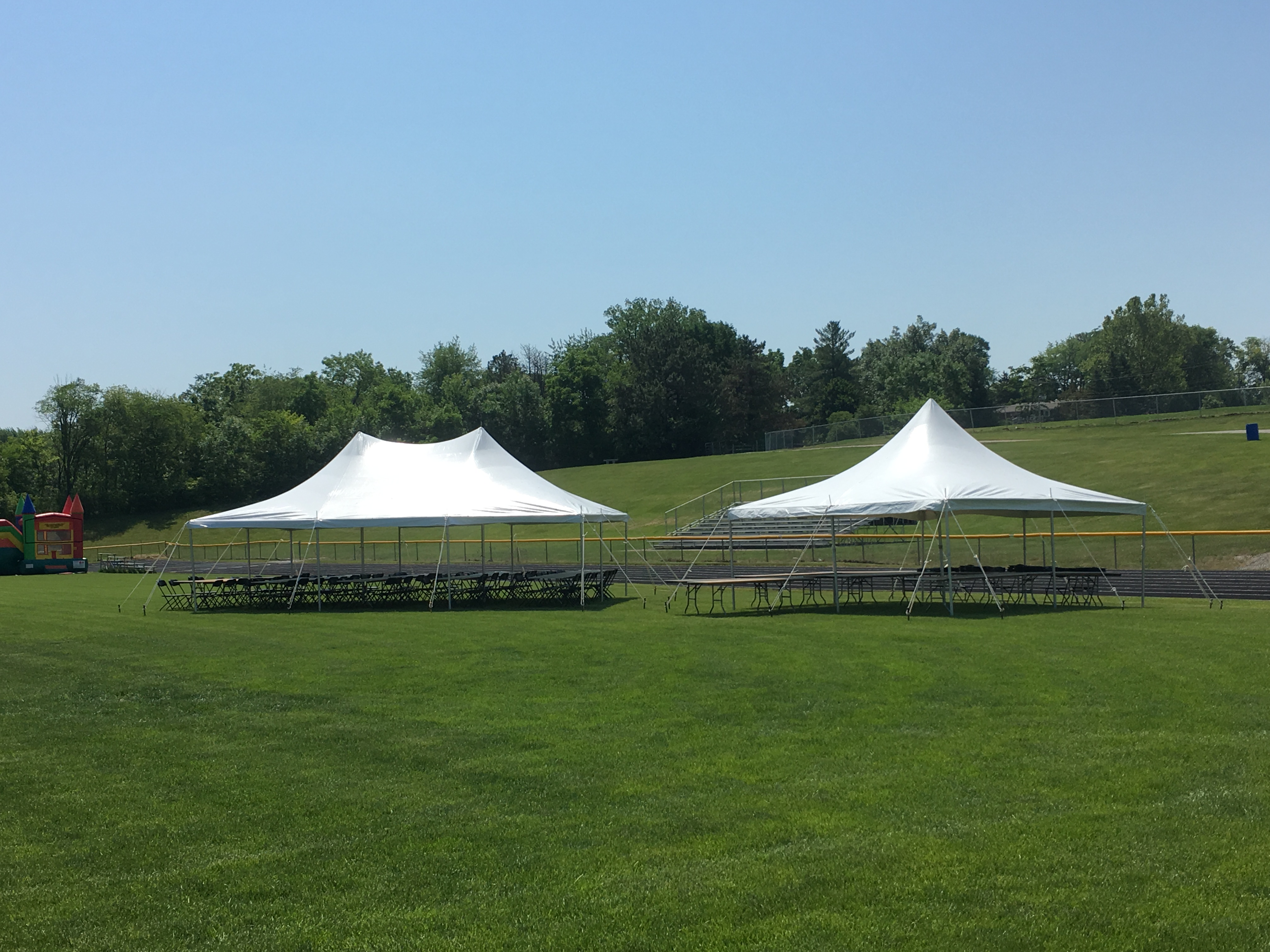 20'x30' rope and pole tent (middle) and 20'x20' rope and pole tent (right)